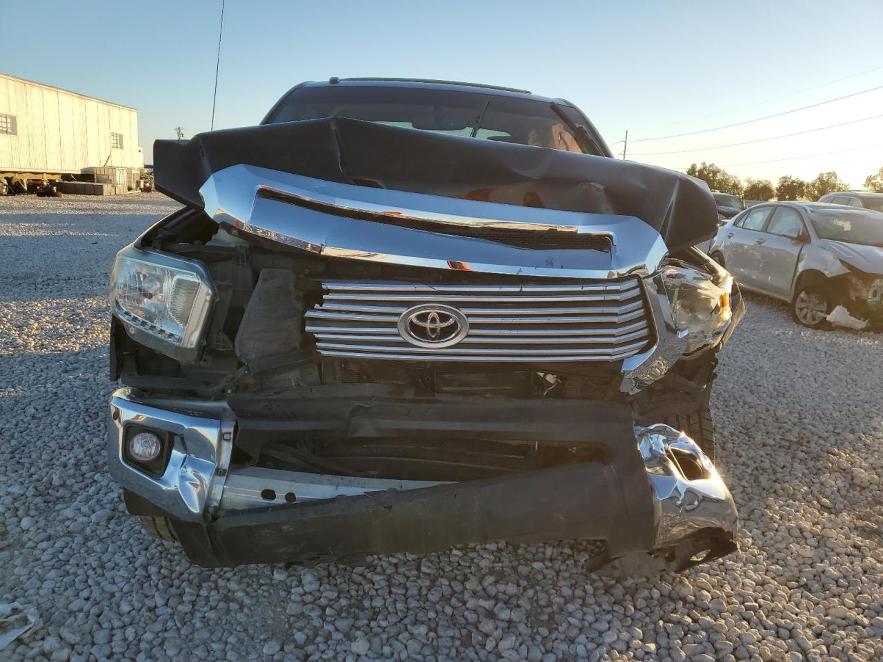 2016 Toyota Tundra VIN 5TFFW5F1XGX203923 Copart auction photo, front end damage thumbnail 5