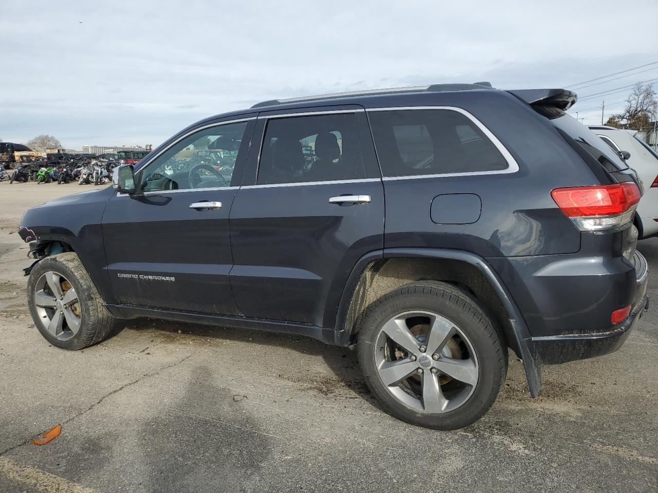 2015 Jeep Grand Cherokee VIN 1C4RJFCG7FC822463 Copart auction photo, front end / undercarriage damage thumbnail 2