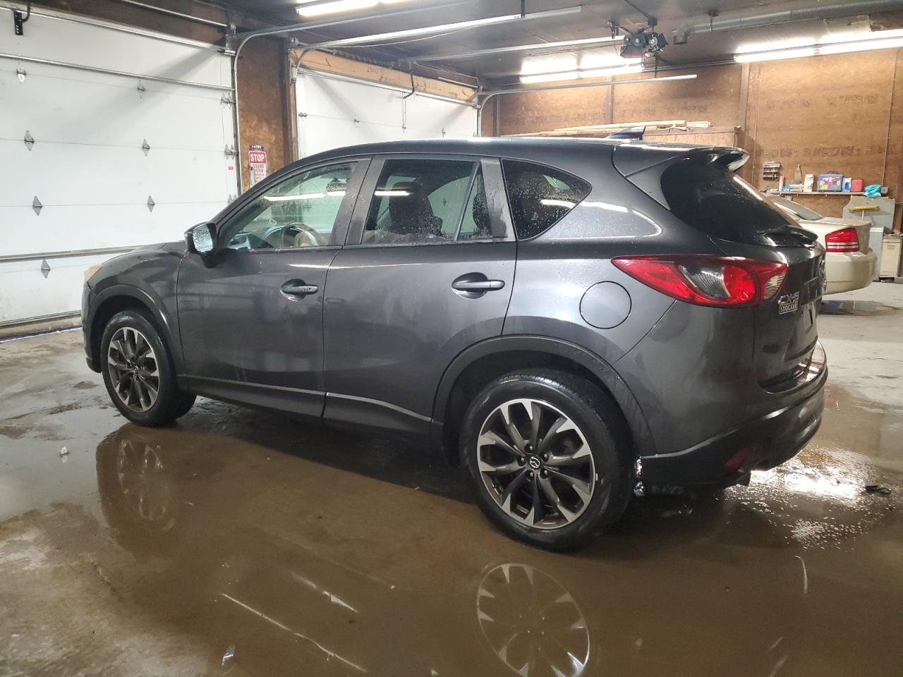 2016 Mazda CX-5 VIN JM3KE2DY5G0718716 Copart auction photo, side damage thumbnail 2