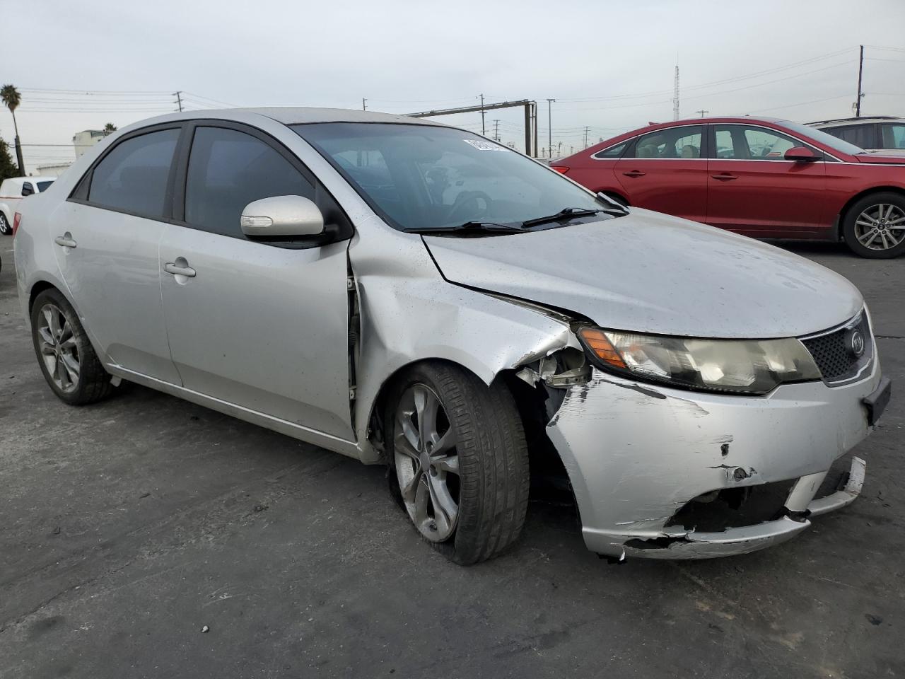 2010 KIA Forte VIN KNAFU4A27A5142840 Copart auction photo, all over / undercarriage damage thumbnail 4