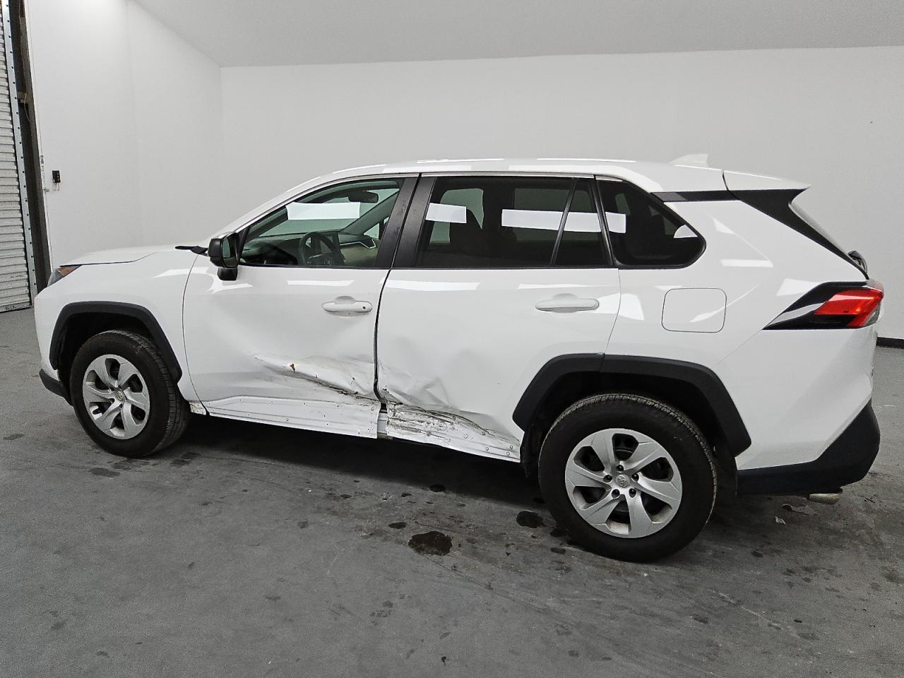 2022 Toyota RAV 4 VIN 2T3H1RFV0NW189288 Copart auction photo, side damage thumbnail 2