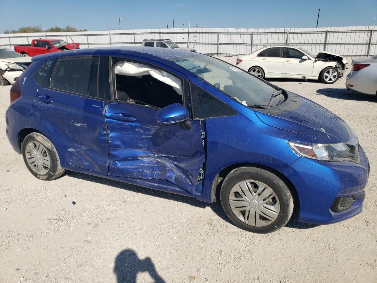 2019 Honda Fit VIN 3HGGK5H46KM737539 Copart auction photo, side / minor dent/scratches damage thumbnail 4