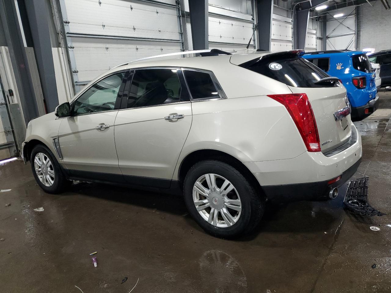 2014 Cadillac SRX VIN 3GYFNEE35ES549117 Copart auction photo, all over damage thumbnail 2