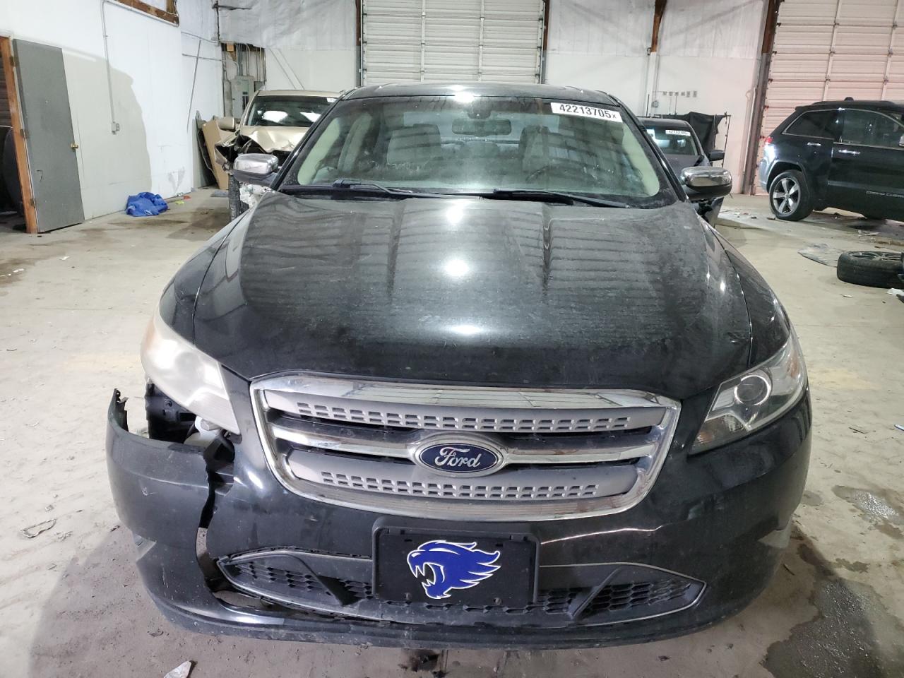 2012 Ford Taurus VIN 1FAHP2FW6CG142909 Copart auction photo, rear end / front end damage thumbnail 5