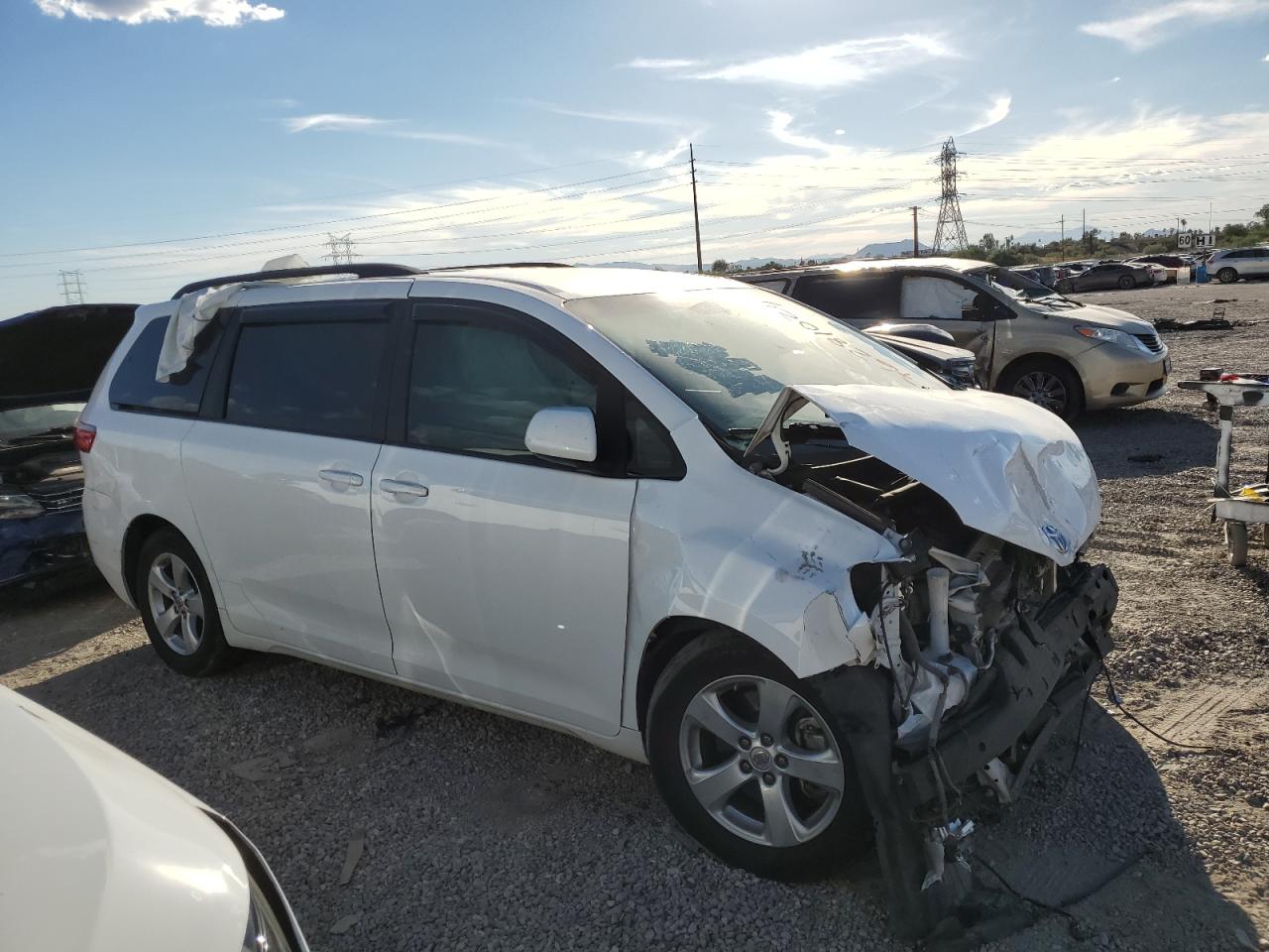 2016 Toyota Sienna VIN 5TDKK3DC8GS727001 Copart auction photo, front end / undercarriage damage thumbnail 4