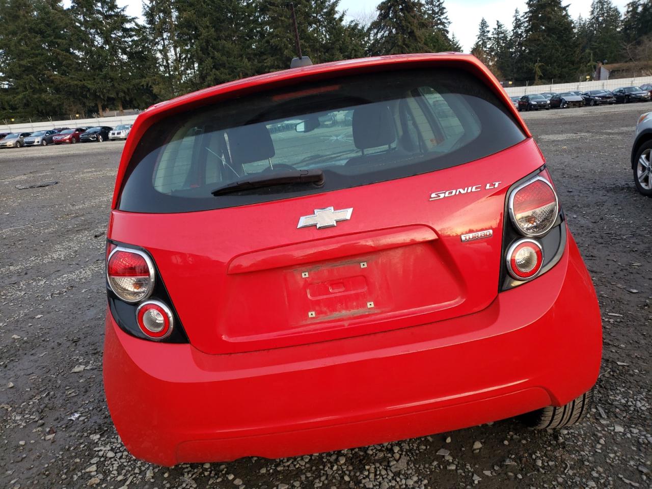 2015 Chevrolet Sonic VIN 1G1JC6SB4F4140480 Copart auction photo, all over damage thumbnail 6