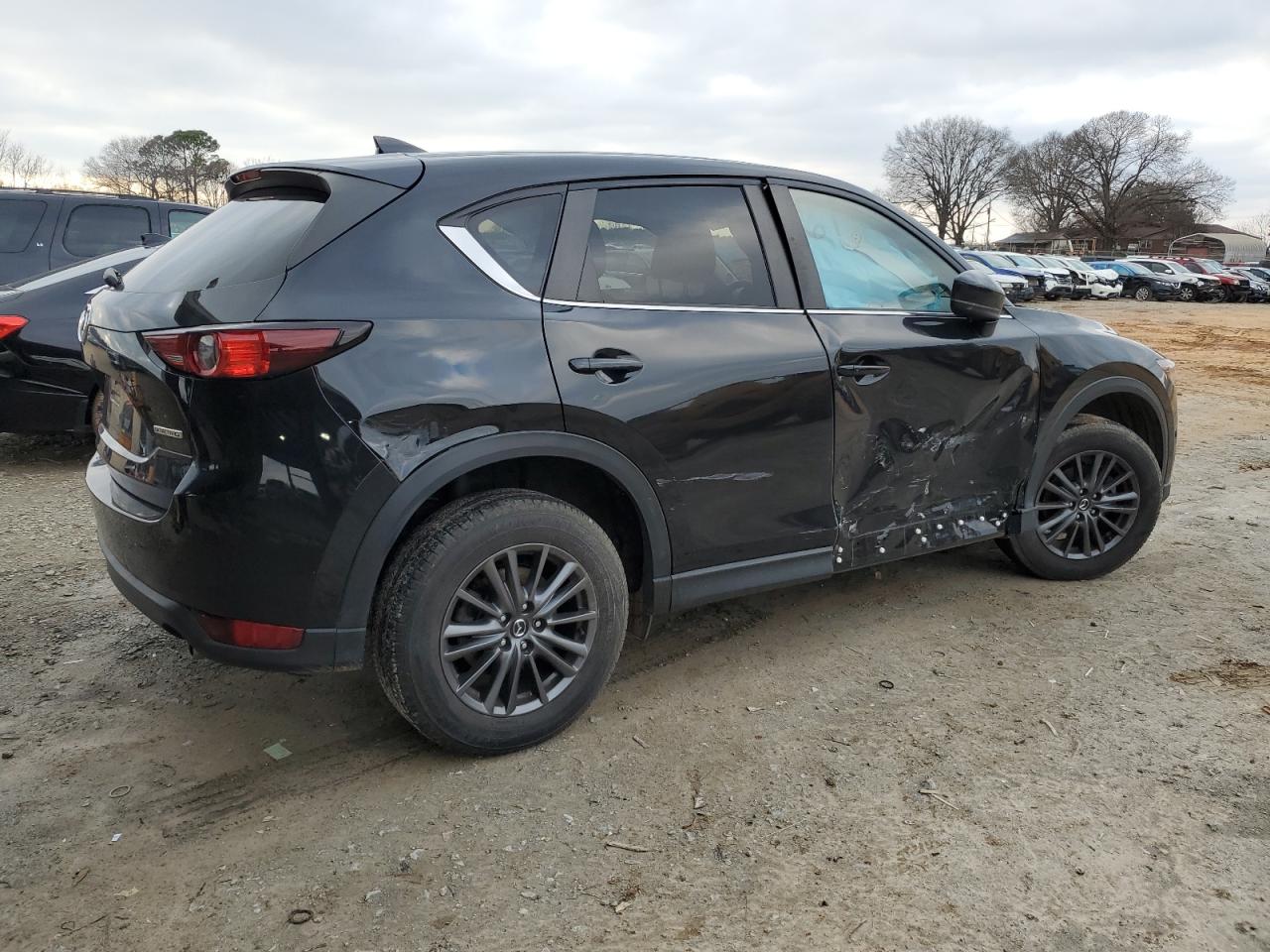 2020 Mazda CX-5 VIN JM3KFBCM7L0857560 Copart auction photo, side / rear end damage thumbnail 3