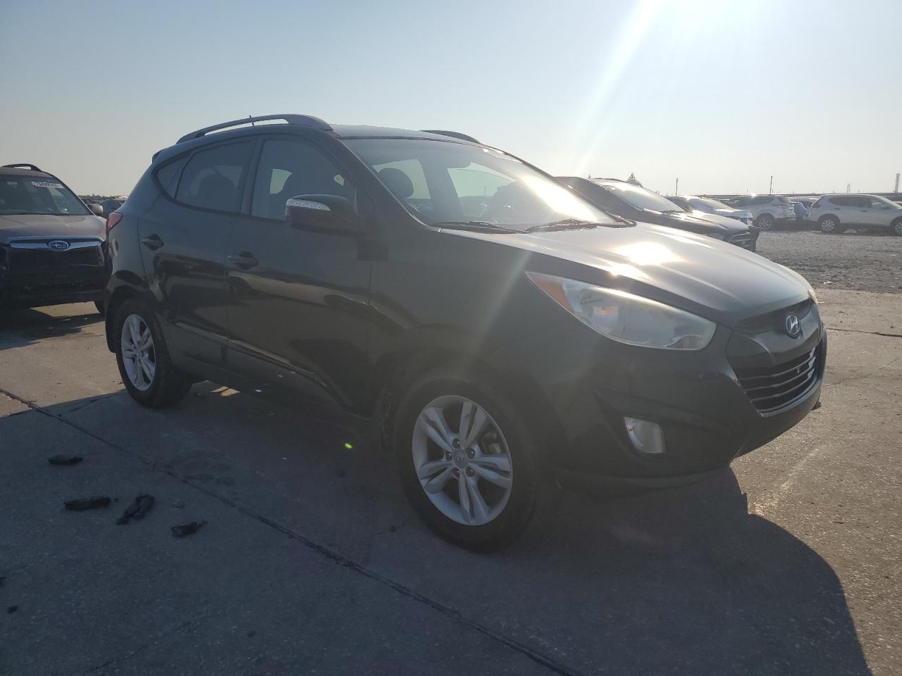 2013 Hyundai Tucson VIN KM8JU3AC7DU562295 Copart auction photo, rear end damage thumbnail 4