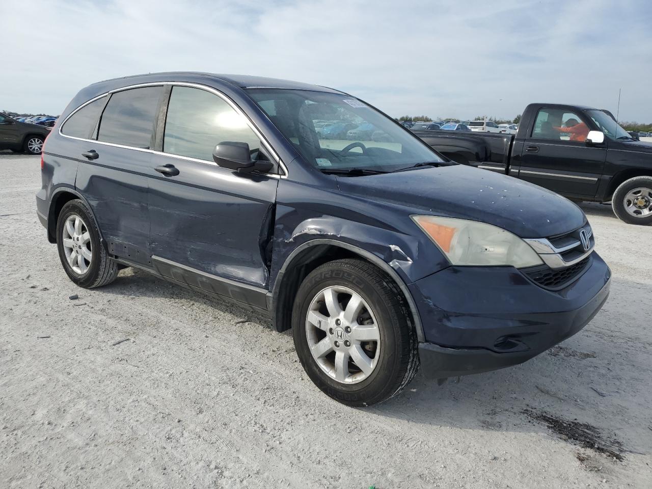 2011 Honda CR-V VIN 5J6RE3H40BL037479 Copart auction photo, side / front end damage thumbnail 4