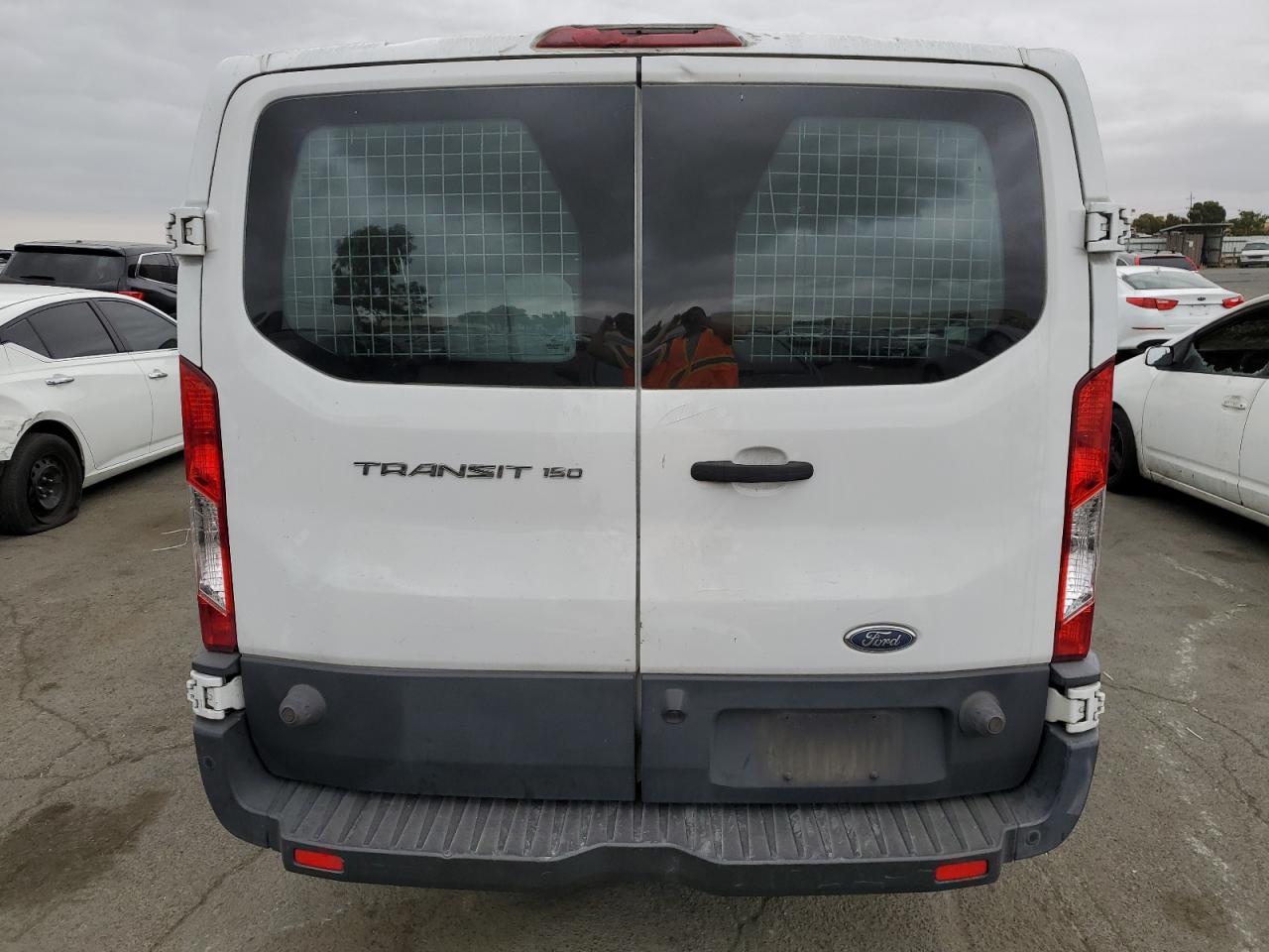 2016 Ford Transit VIN 1FTYE2YM9GKA36839 Copart auction photo, all over damage thumbnail 6