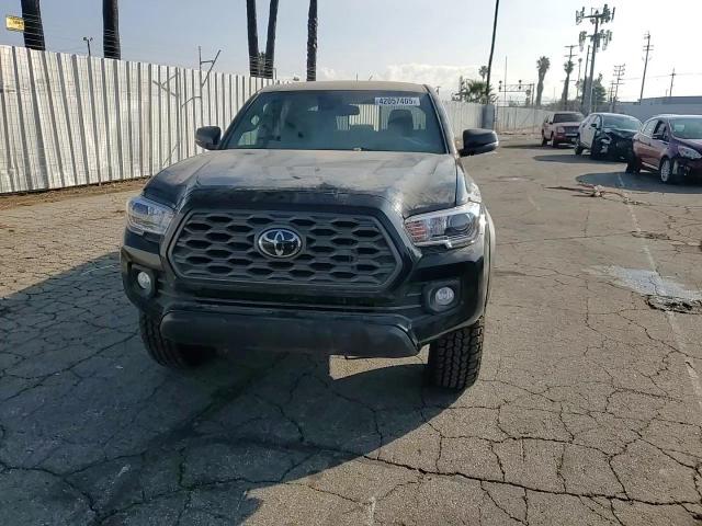 2022 Toyota Tacoma VIN 3TMCZ5AN0NM475548 Copart auction photo, stripped / minor dent/scratches damage thumbnail 10