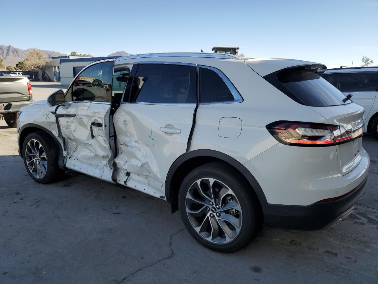 2021 Lincoln Nautilus VIN 2LMPJ6K96MBL18185 Copart auction photo, side / front end damage thumbnail 2