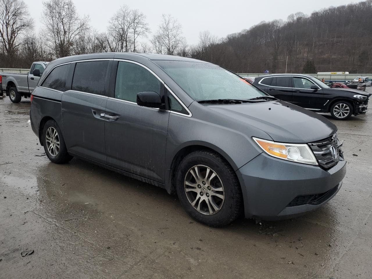 2012 Honda Odyssey VIN 5FNRL5H66CB143545 Copart auction photo, front end / side damage thumbnail 4