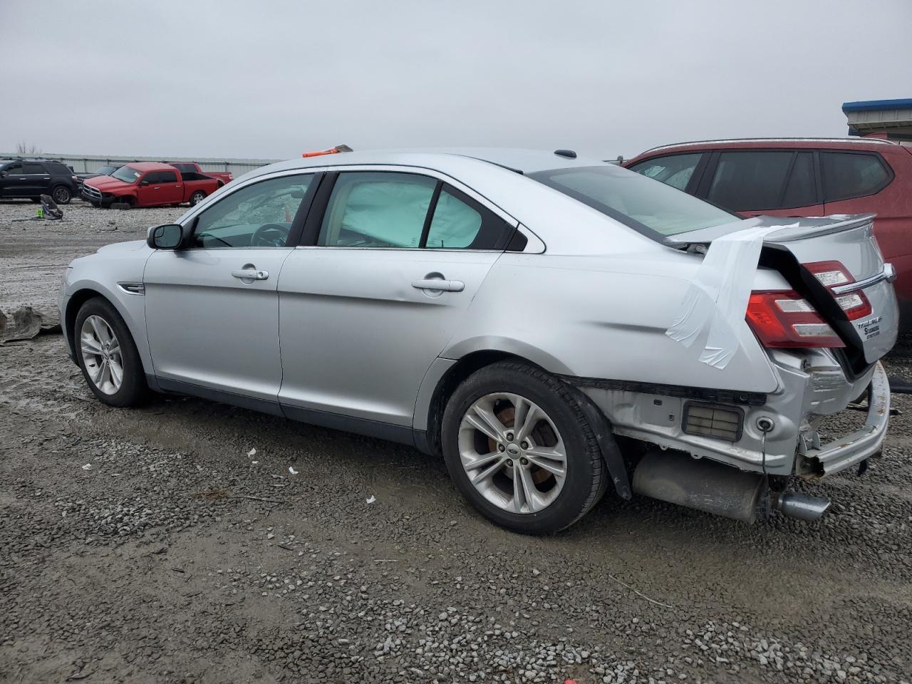 2015 Ford Taurus VIN 1FAHP2H88FG151257 Copart auction photo, side / rear end damage thumbnail 2