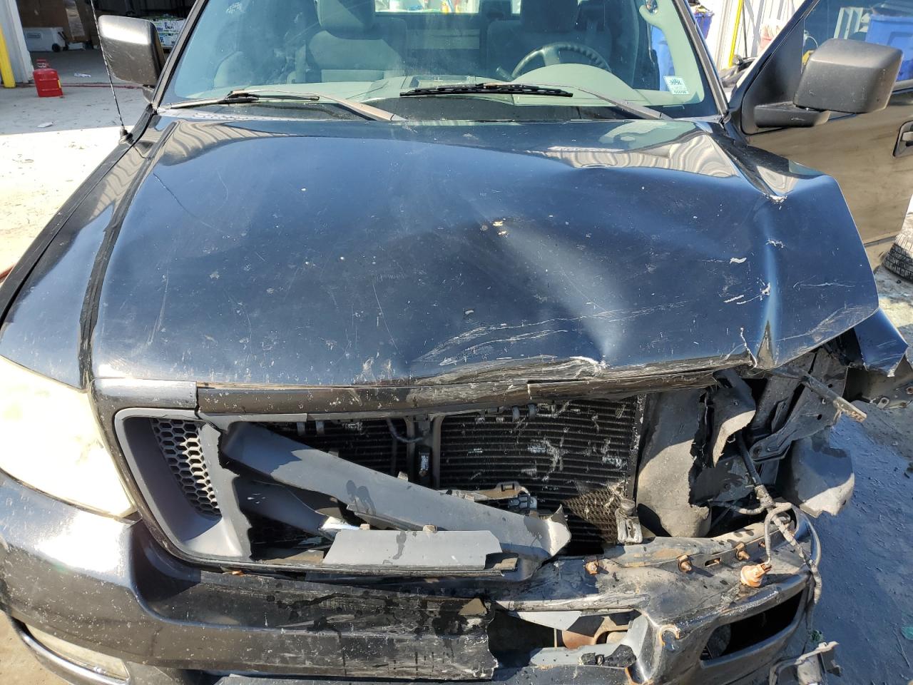 2005 Ford F-150 VIN 1FTRF12WX5NA21395 Copart auction photo, front end damage thumbnail 11
