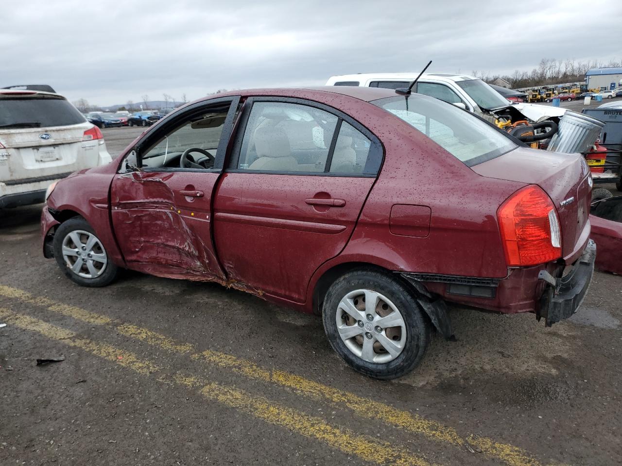 2010 Hyundai Accent VIN KMHCN4AC9AU487395 Copart auction photo, side / rear end damage thumbnail 2