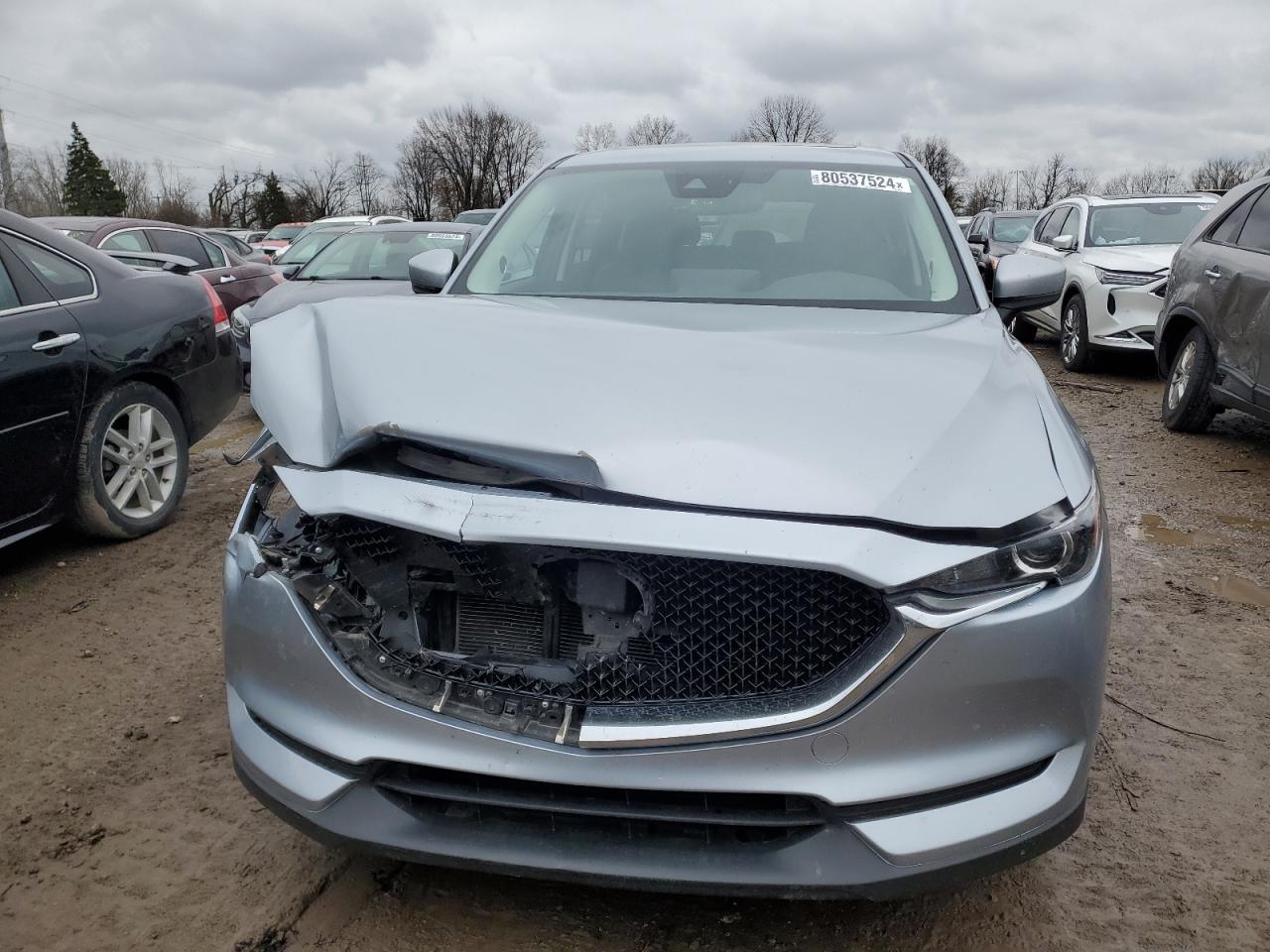 2021 Mazda CX-5 VIN JM3KFBCM7M1474827 Copart auction photo, front end / side damage thumbnail 5