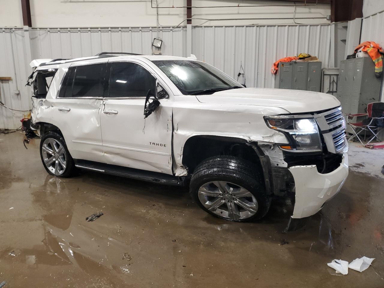 2019 Chevrolet Tahoe VIN 1GNSKCKCXKR208663 Copart auction photo, all over damage thumbnail 4