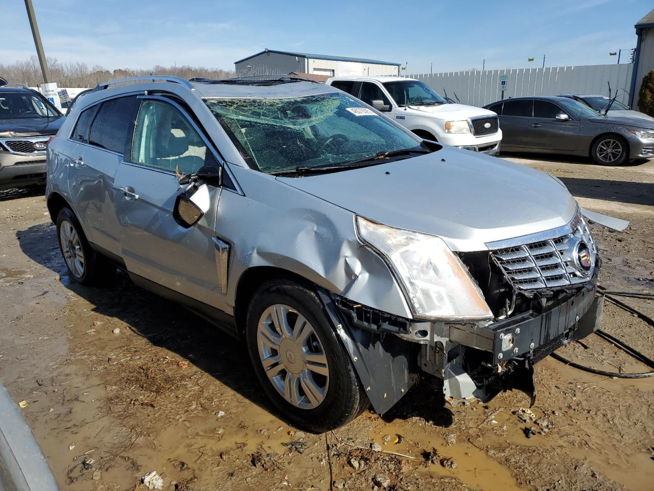 2014 Cadillac SRX VIN 3GYFNBE39ES517088 Copart auction photo, rollover damage thumbnail 4