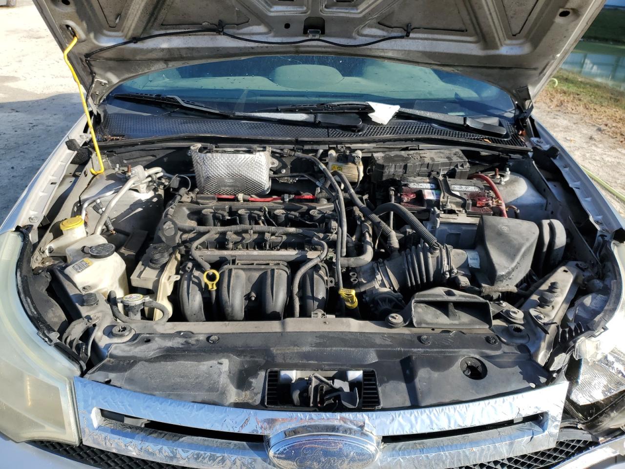 2010 Ford Focus VIN 1FAHP3FNXAW198920 Copart auction photo, front end / side damage thumbnail 11