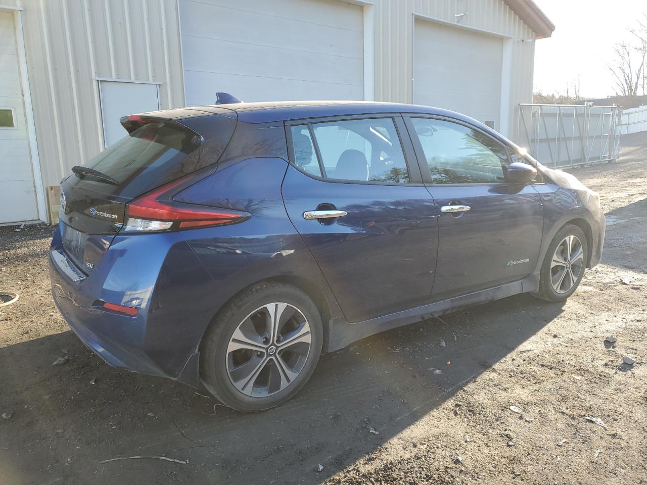 2018 Nissan Leaf VIN 1N4AZ1CPXJC305682 Copart auction photo, side / front end damage thumbnail 3