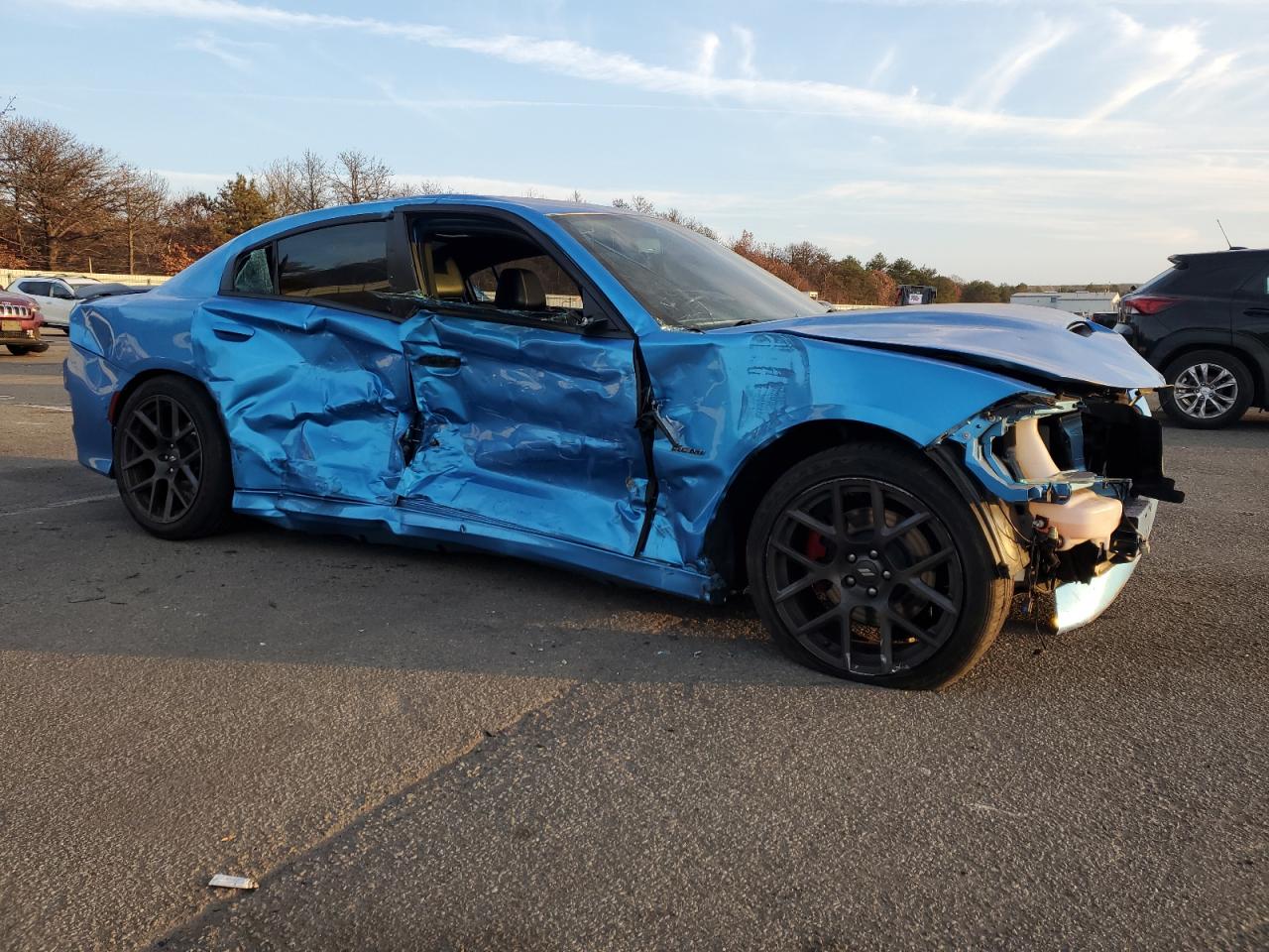 2019 Dodge Charger VIN 2C3CDXCT1KH562282 Copart auction photo, side / front end damage thumbnail 4