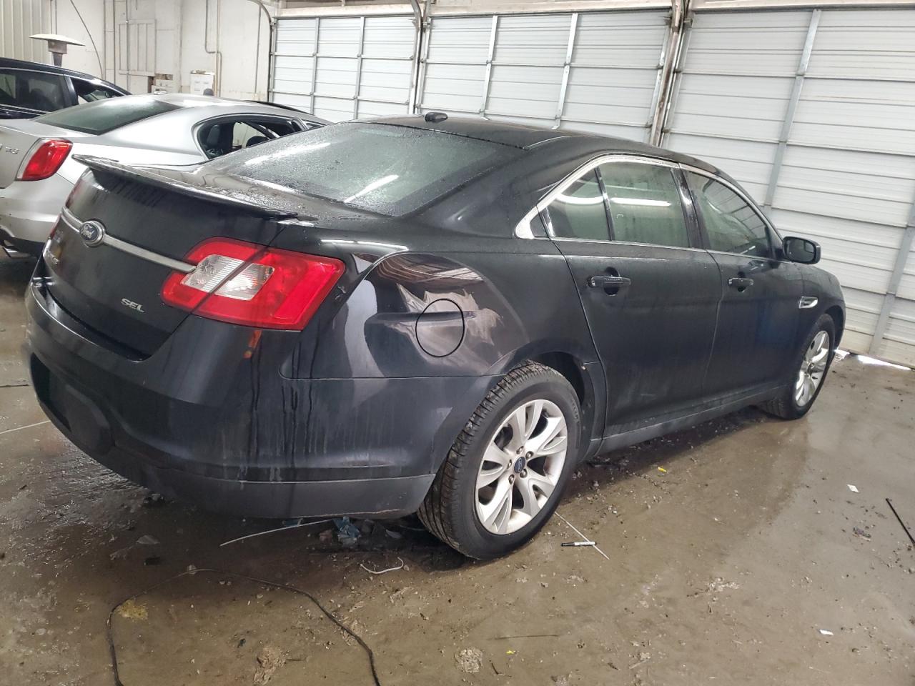 2012 Ford Taurus VIN 1FAHP2EW8CG104339 Copart auction photo, front end / minor dent/scratches damage thumbnail 3