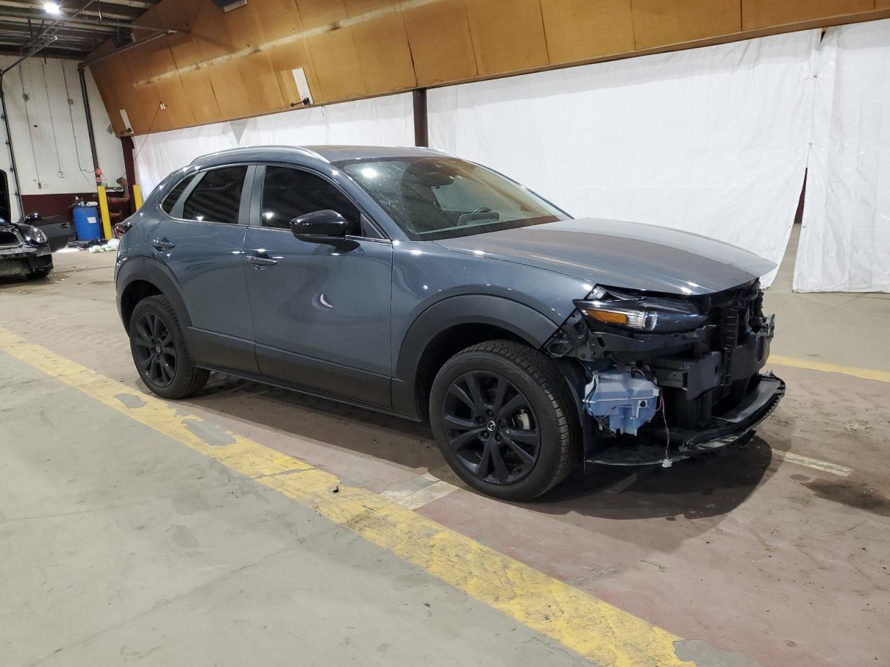 2022 Mazda CX-30 VIN 3MVDMBCL2NM445298 Copart auction photo, front end / side damage thumbnail 4