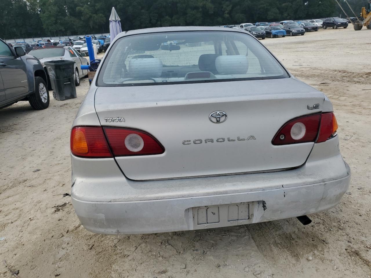 2001 Toyota Corolla VIN 1NXBR12E71Z454989 Copart auction photo, all over damage thumbnail 6