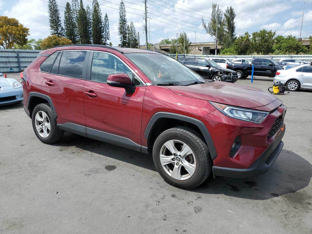 2019 Toyota RAV 4 VIN JTMW1RFV9KD500555 Copart auction photo, side damage thumbnail 4