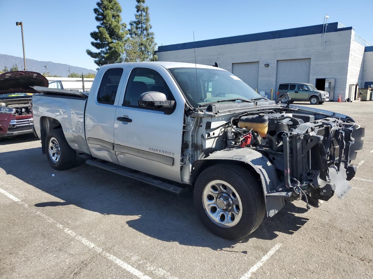 2012 Chevrolet Silverado VIN 1GCRCREA3CZ156490 Copart auction photo, front end / side damage thumbnail 4