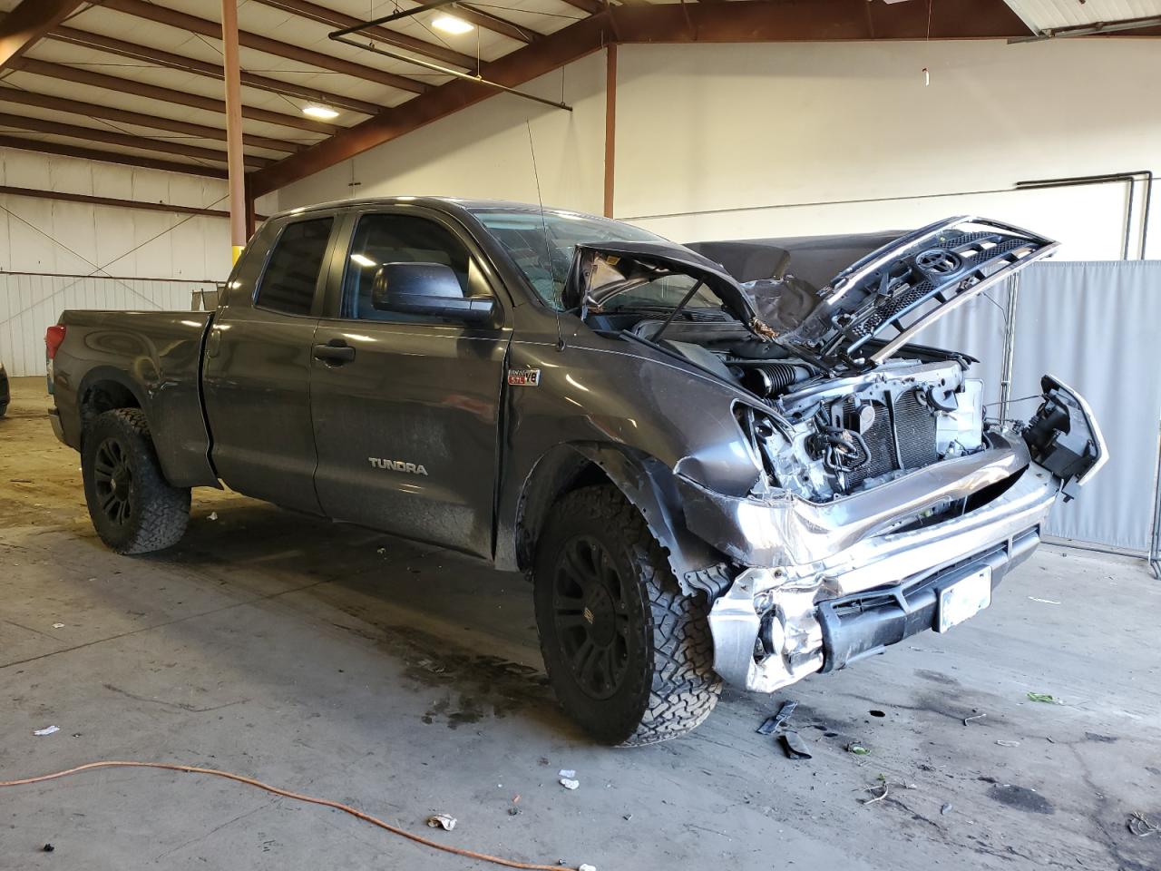 2011 Toyota Tundra VIN 5TFUY5F10BX183823 Copart auction photo, front end / top/roof damage thumbnail 4