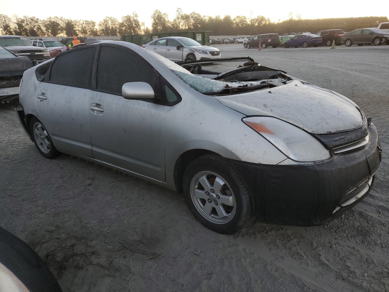 2005 Toyota Prius VIN JTDKB22UX57021144 Copart auction photo, top/roof damage thumbnail 4