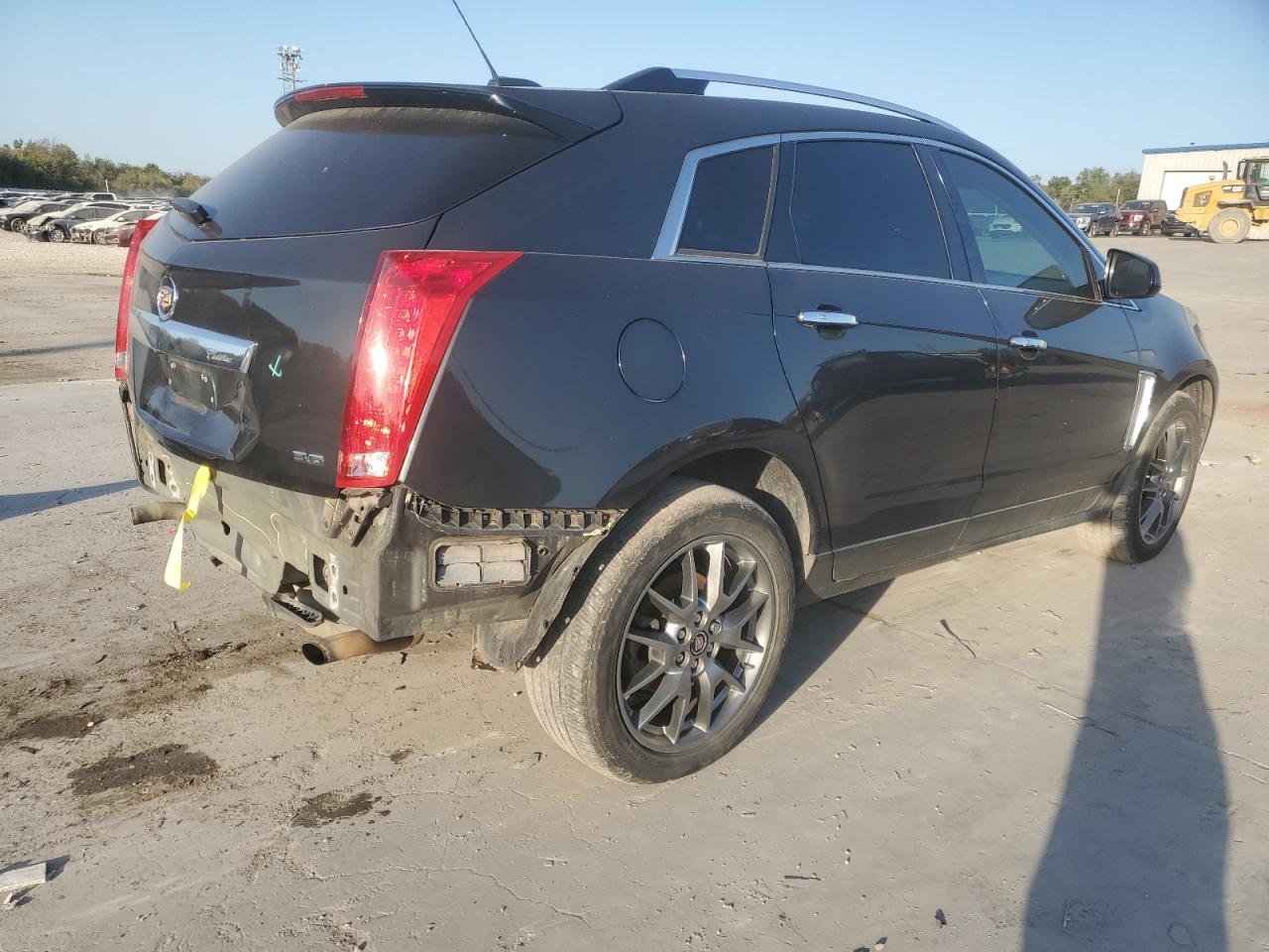 2015 Cadillac SRX VIN 3GYFNDE34FS611912 Copart auction photo, rear end / minor dent/scratches damage thumbnail 3