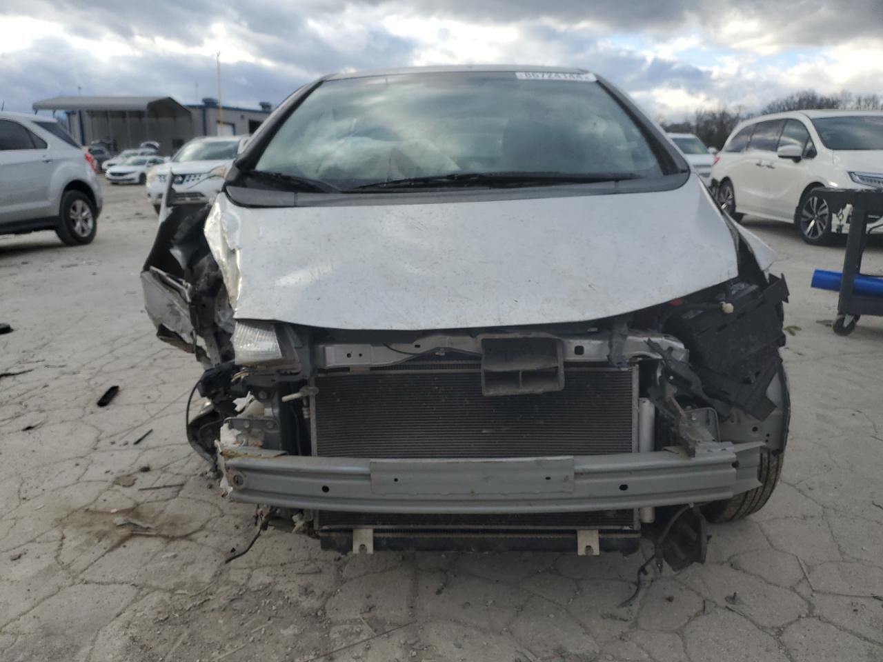 2016 Honda Fit VIN JHMGK5H56GX001806 Copart auction photo, all over damage thumbnail 5