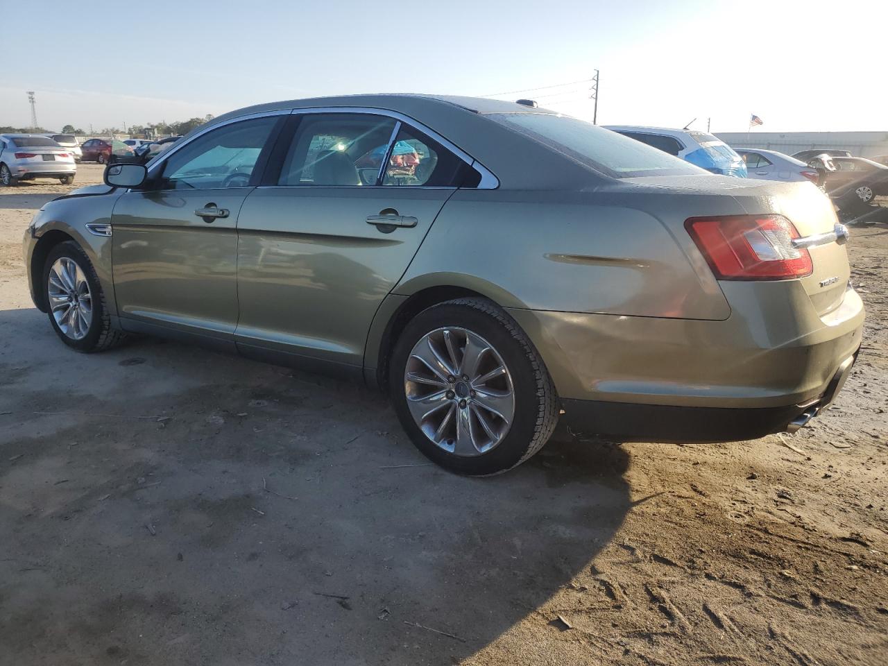 2012 Ford Taurus VIN 1FAHP2FW3CG110354 Copart auction photo, front end / minor dent/scratches damage thumbnail 2