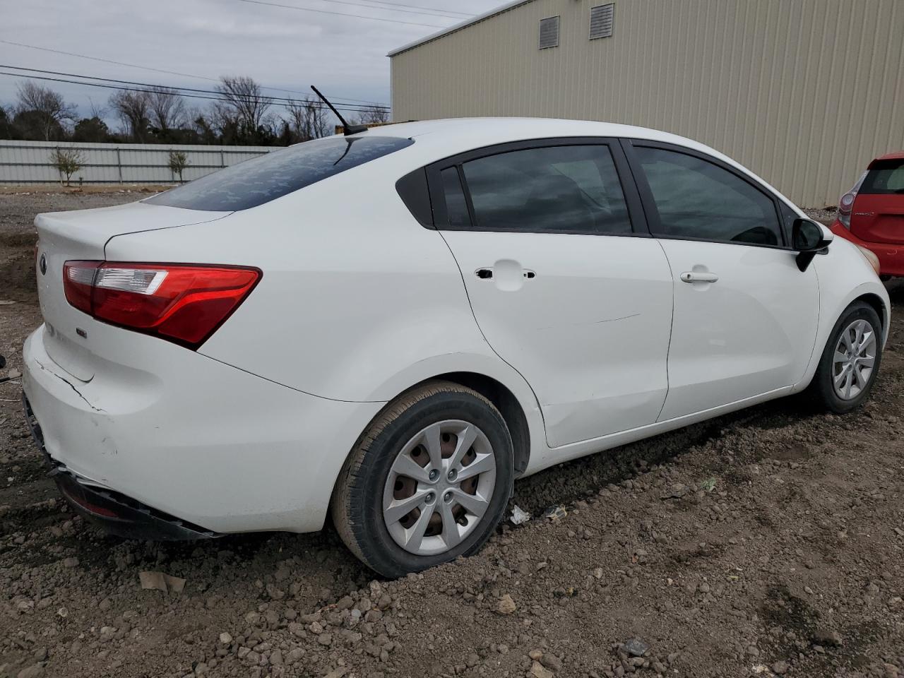 2015 KIA Rio VIN KNADM4A3XF6479357 Copart auction photo, side / rear end damage thumbnail 3