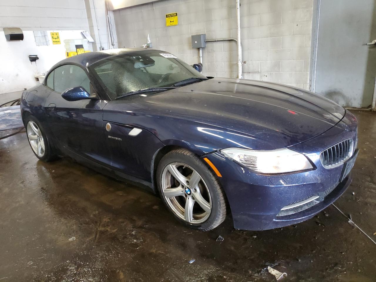 2011 BMW Z4 VIN WBALM5C52BE380399 Copart auction photo, front end damage thumbnail 4