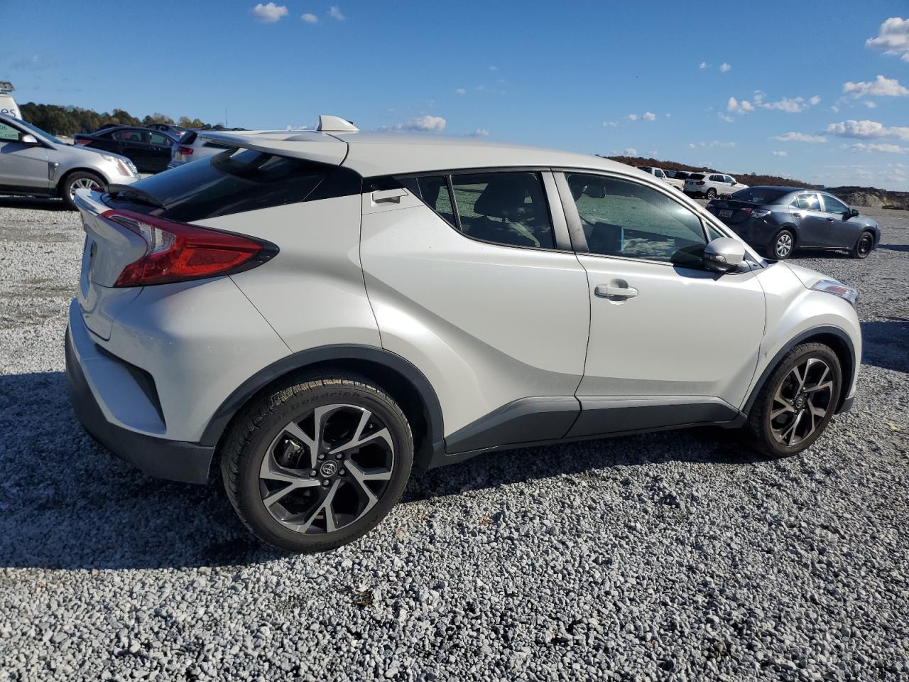 2019 Toyota C-HR VIN JTNKHMBX4K1018822 Copart auction photo, side / front end damage thumbnail 3