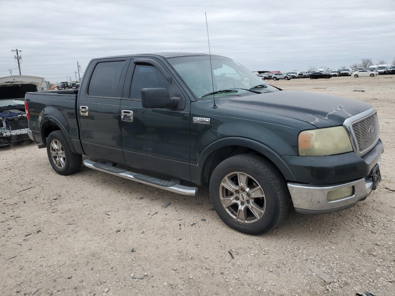 2004 Ford F-150 VIN 1FTPW12594KB86241 Copart auction photo, minor dent/scratches damage thumbnail 4