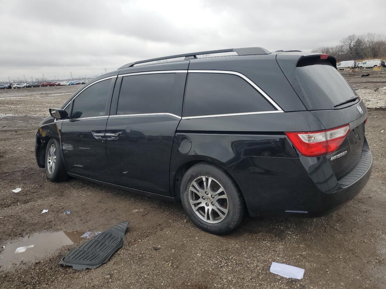 2011 Honda Odyssey VIN 5FNRL5H6XBB080934 Copart auction photo, side / front end damage thumbnail 2