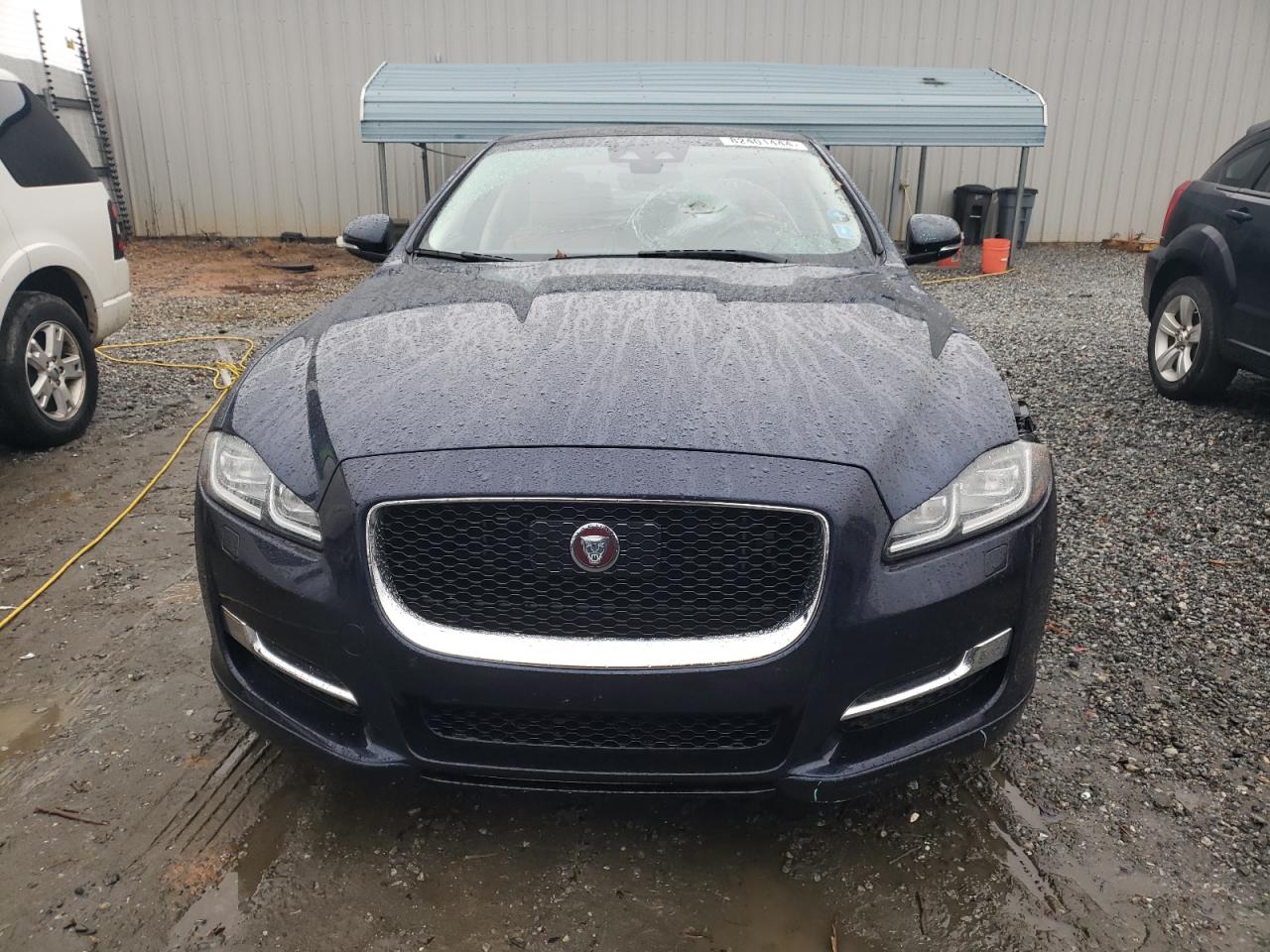 2018 Jaguar XJ VIN SAJWJ1CD4J8W13822 Copart auction photo, side / front end damage thumbnail 5