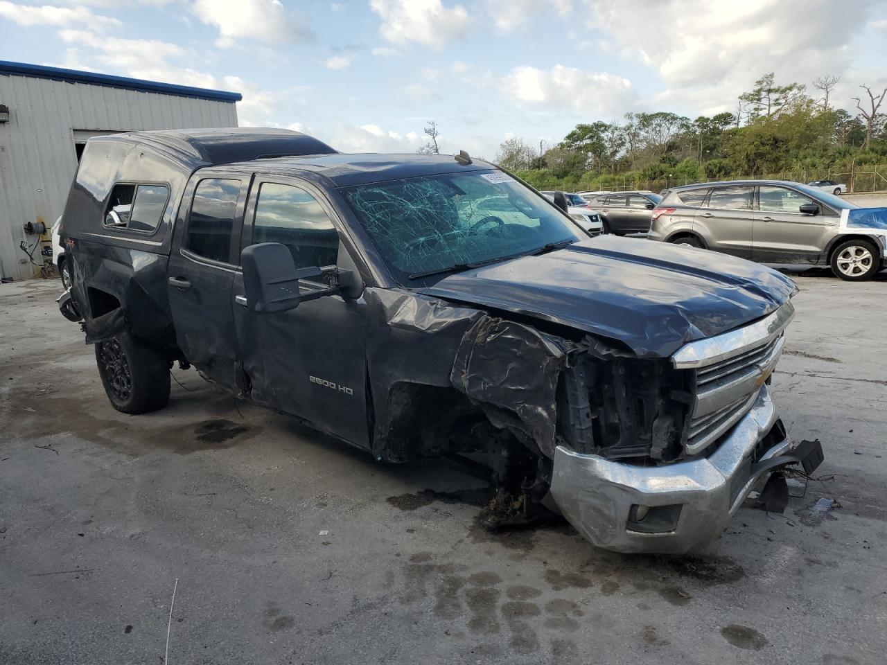 2015 Chevrolet Silverado VIN 1GC2KVEG8FZ140226 Copart auction photo, all over damage thumbnail 4