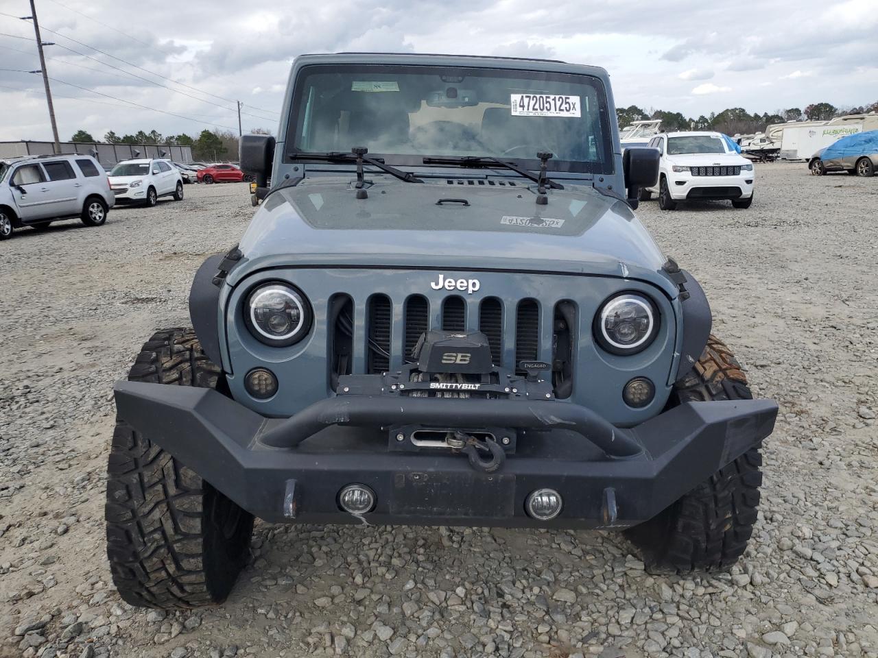 2015 Jeep Wrangler VIN 1C4HJWEG1FL693094 Copart auction photo, front end / undercarriage damage thumbnail 5
