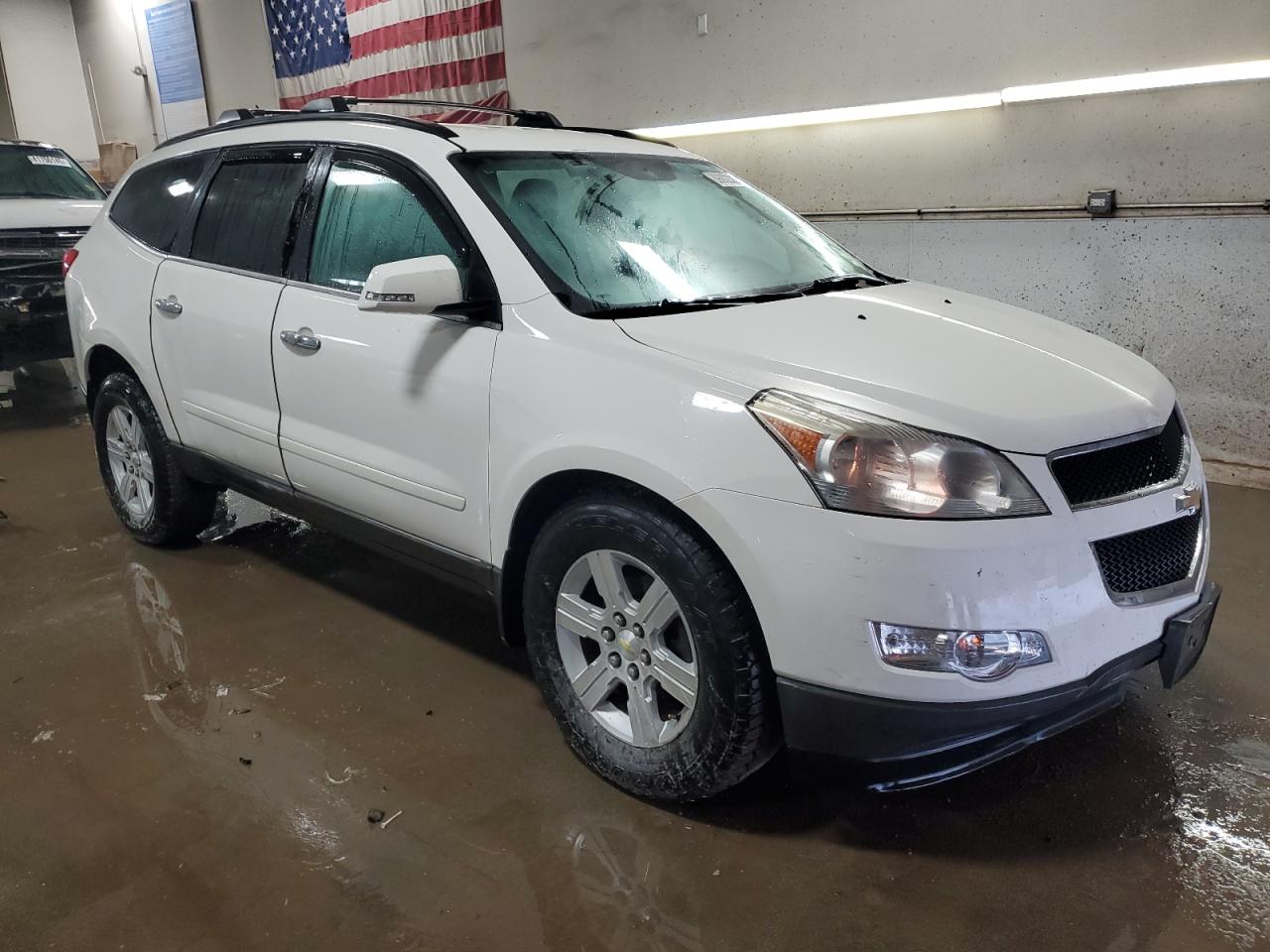 2011 Chevrolet Traverse VIN 1GNKVGED0BJ127611 Copart auction photo, front end / side damage thumbnail 4