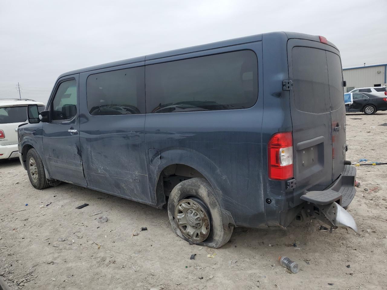 2015 Nissan NV VIN 5BZAF0AAXFN852720 Copart auction photo, all over damage thumbnail 2