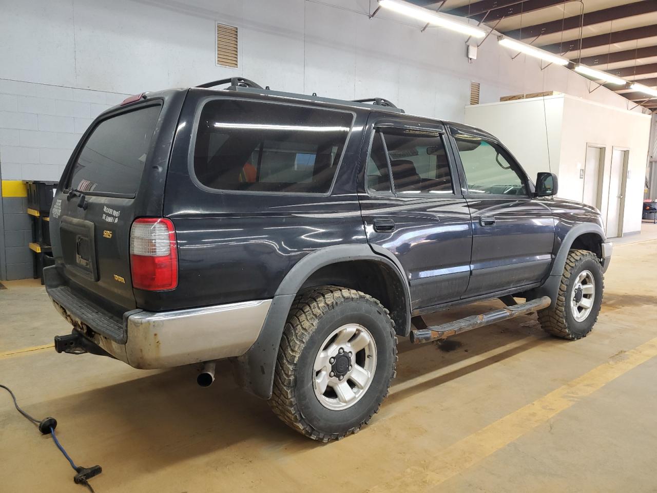 1999 Toyota 4Runner VIN JT3HN86R9X0196866 Copart auction photo, side / rear end damage thumbnail 3