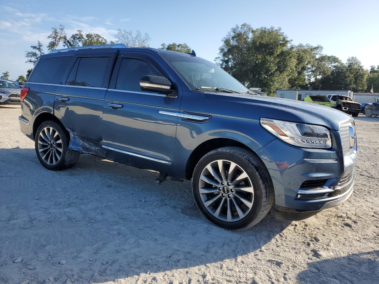 2020 Lincoln Navigator VIN 5LMJJ2KT9LEL21104 Copart auction photo, side / undercarriage damage thumbnail 4