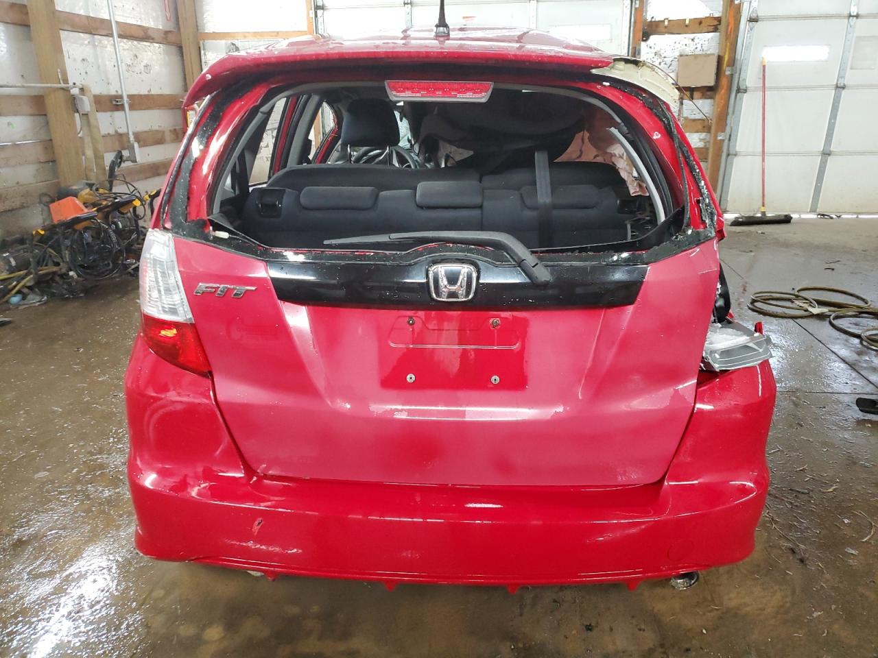 2009 Honda Fit VIN JHMGE88669S007350 Copart auction photo, rollover damage thumbnail 6
