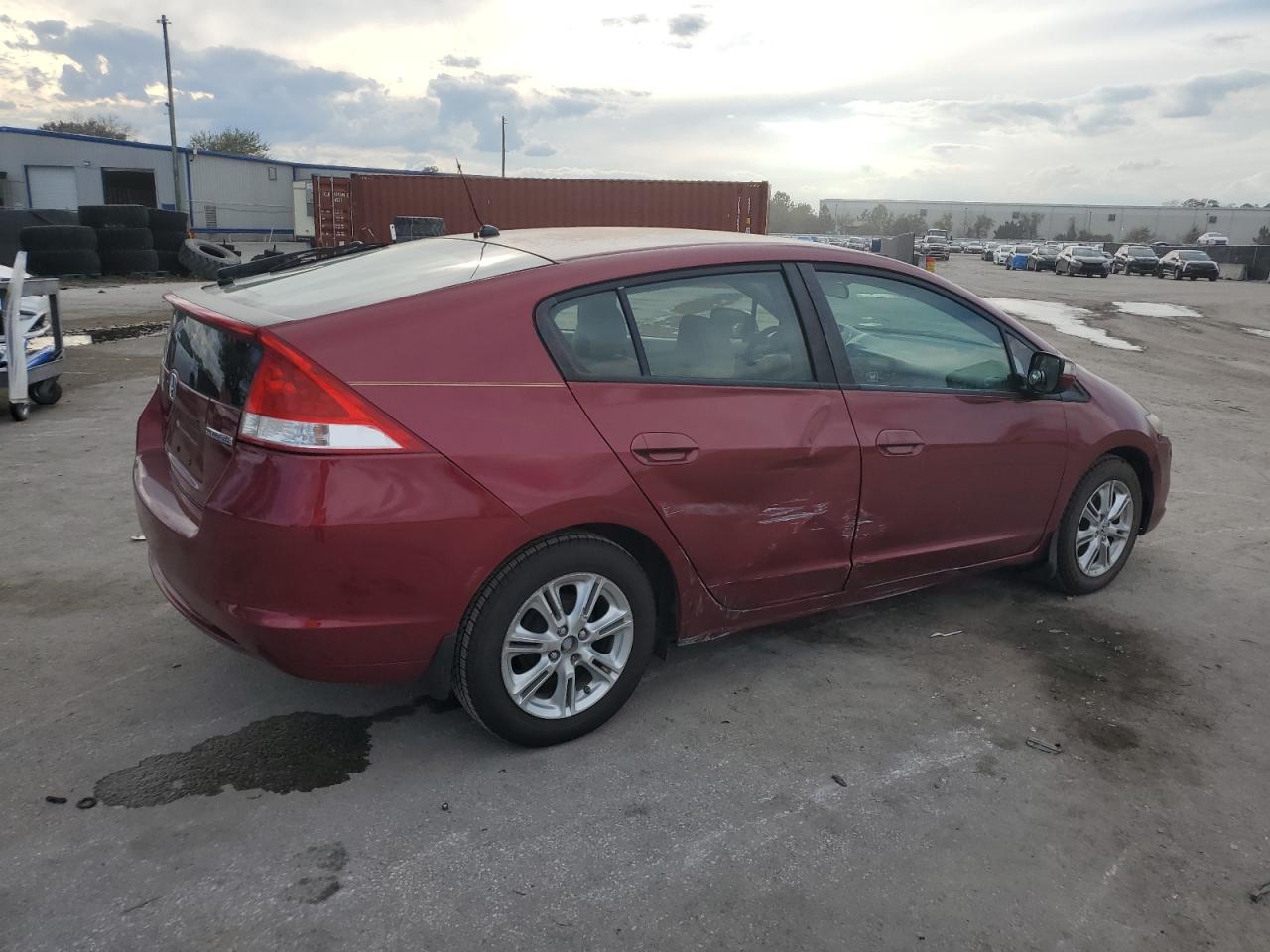 2010 Honda Insight VIN JHMZE2H72AS001211 Copart auction photo, side / front end damage thumbnail 3